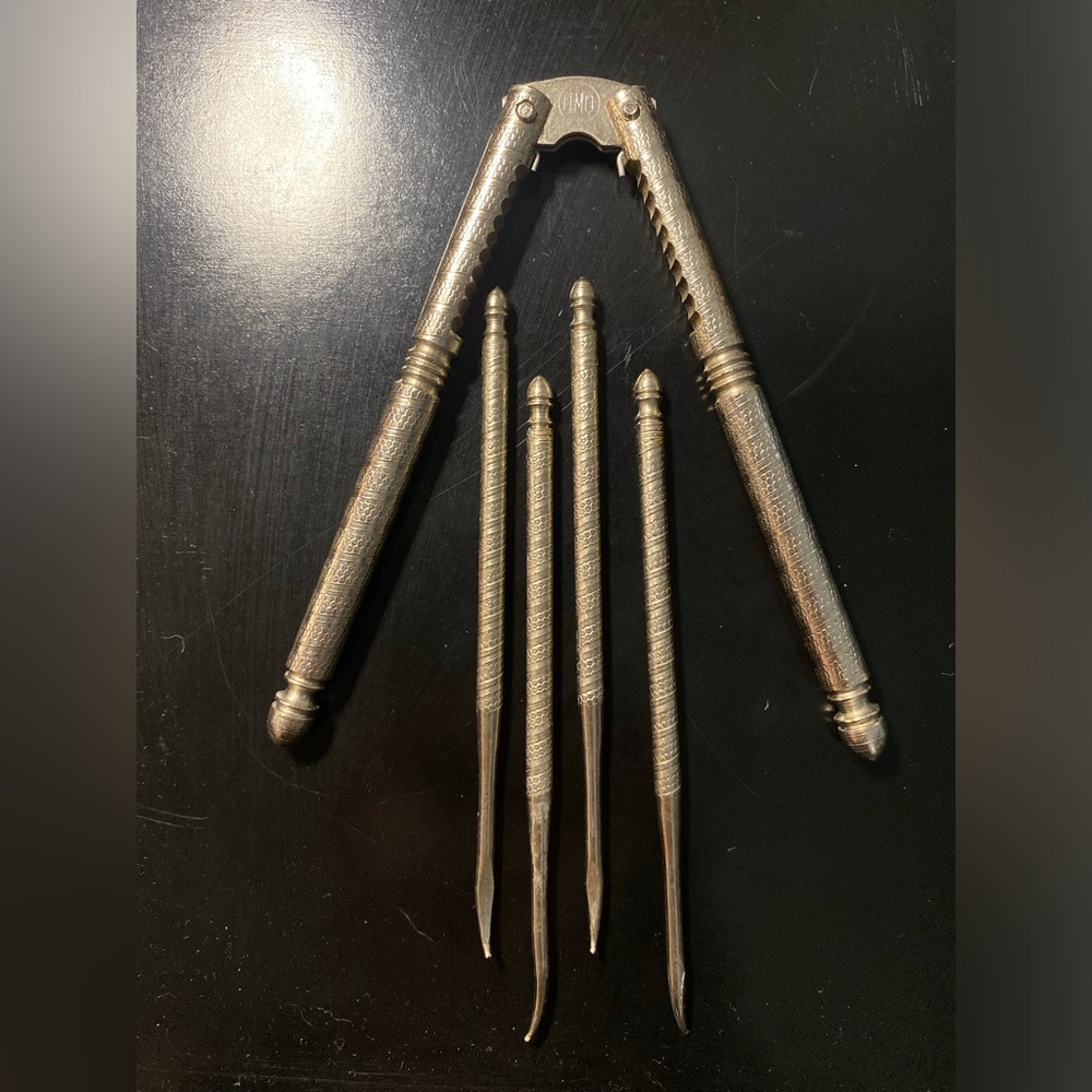 Vintage Ornate Metal Nutcracker with Picks - Silver Tone